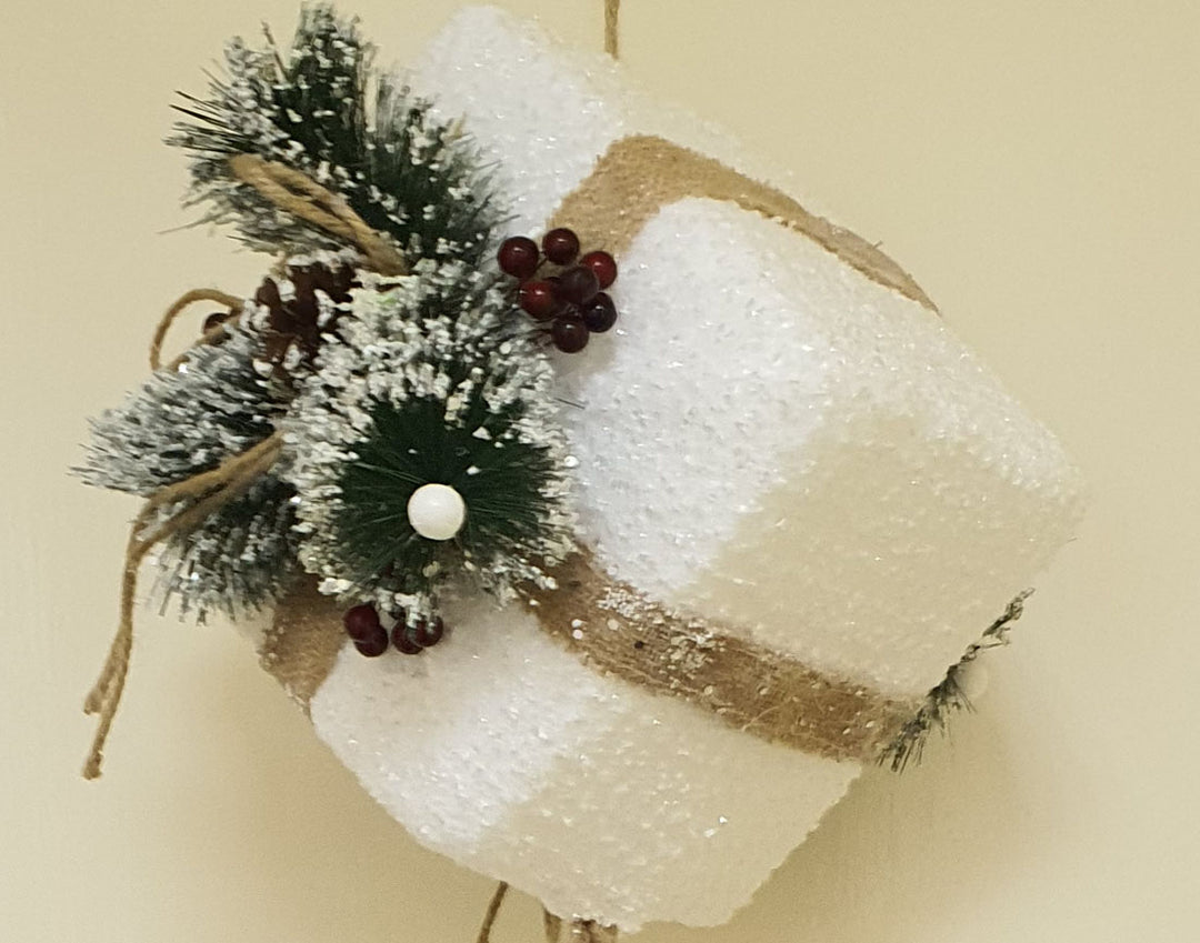 White gift box with baubles