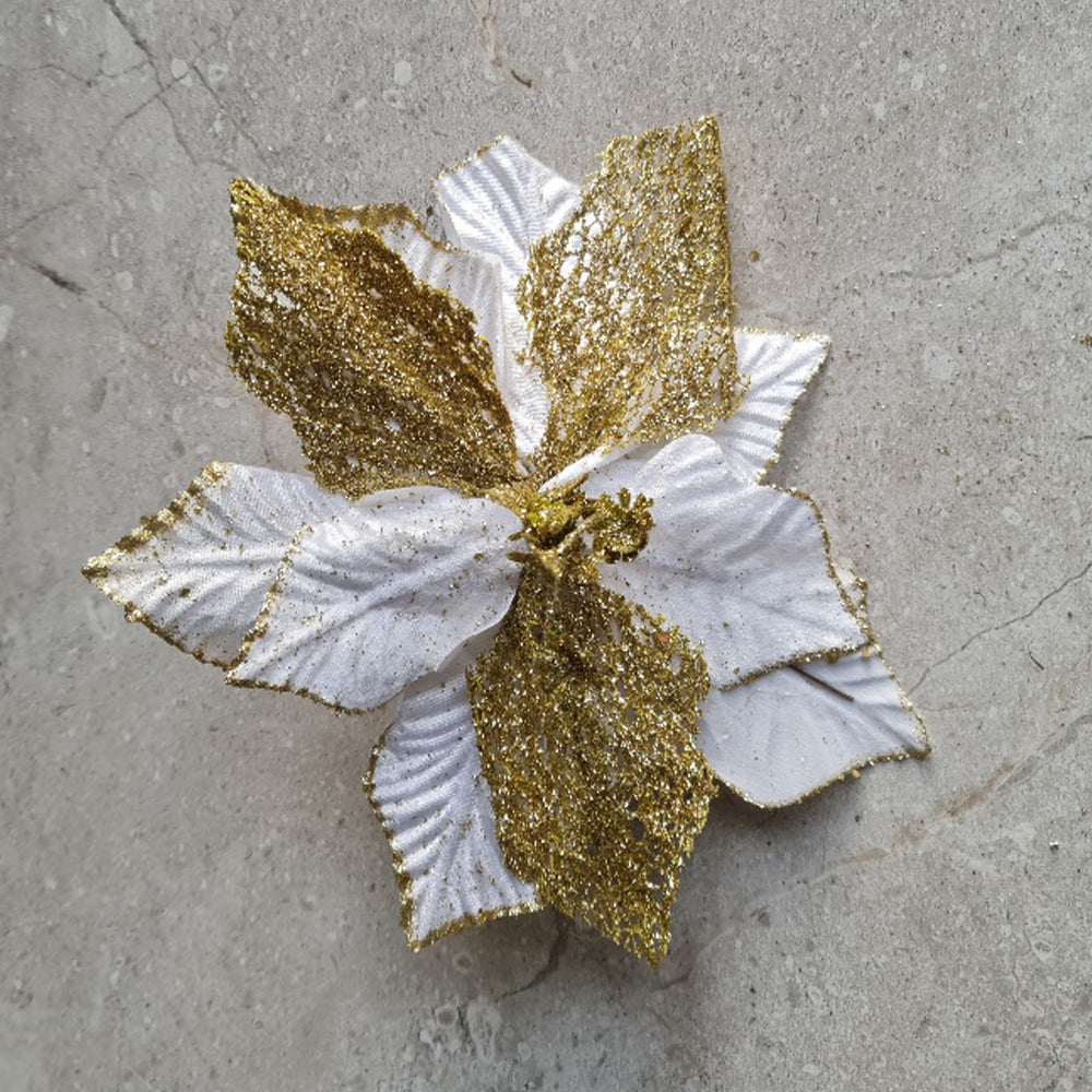 White flower with gold