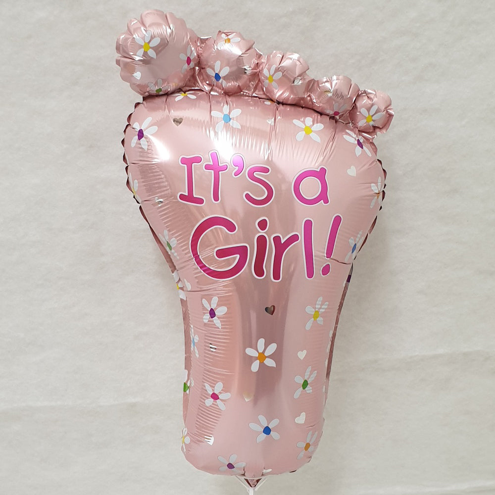 Its a girl baby feet shape foil balloon - uninflated