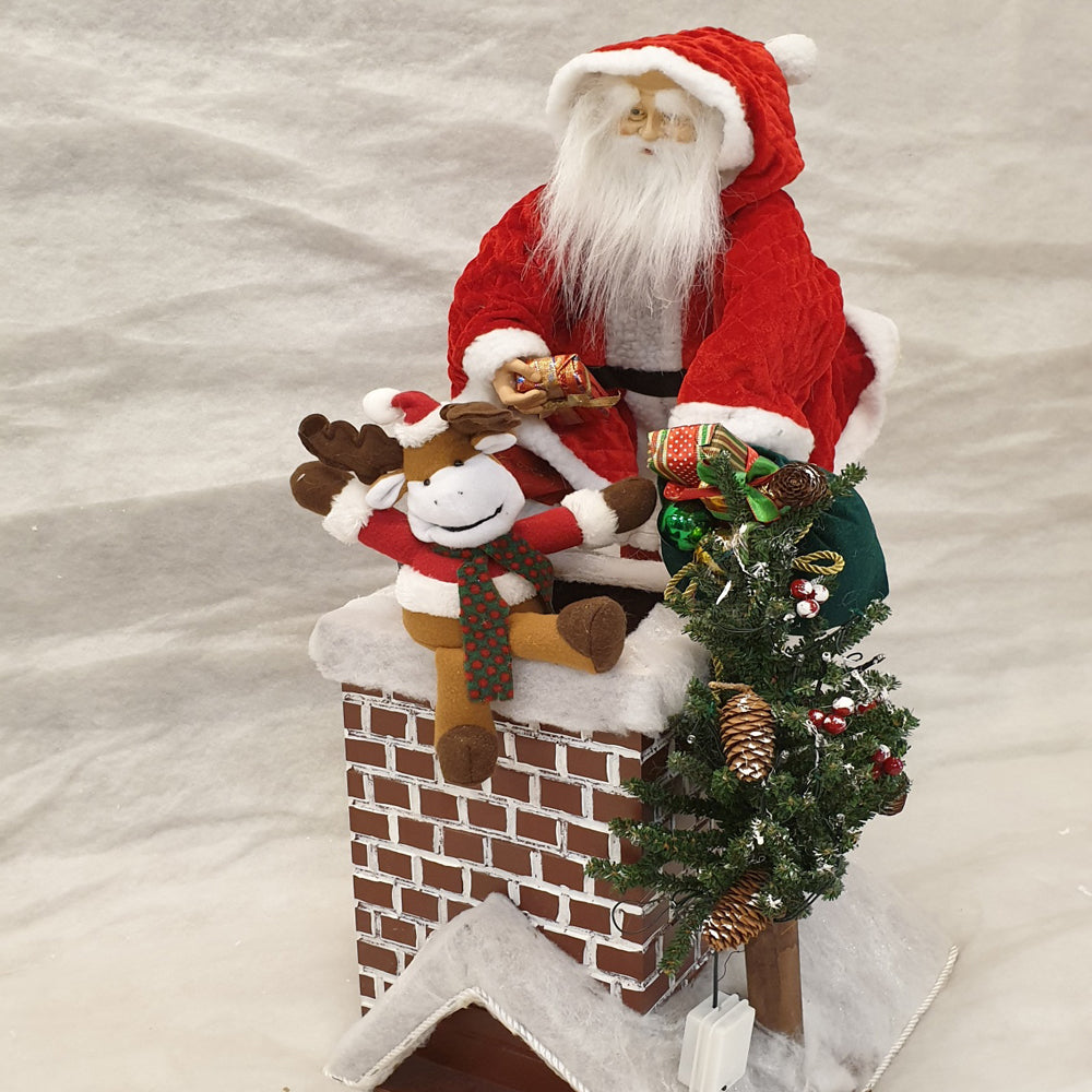 Santa on the chimney top