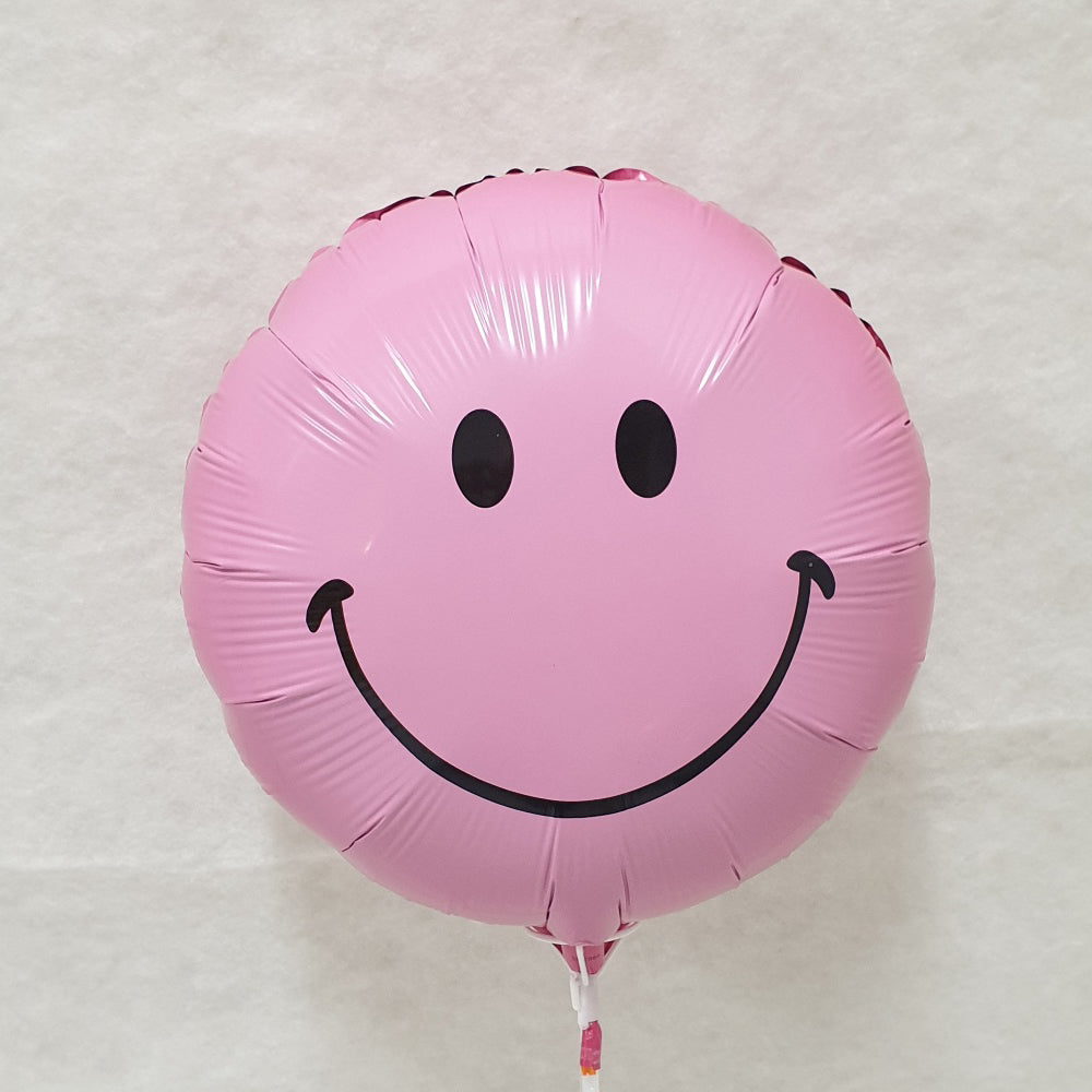 It's a girl - pink smiley face - supplied uninflated